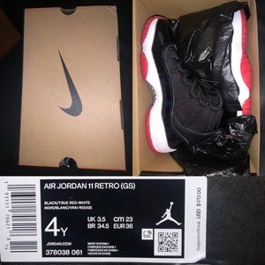Air Jordan bred 11s (grade school)
